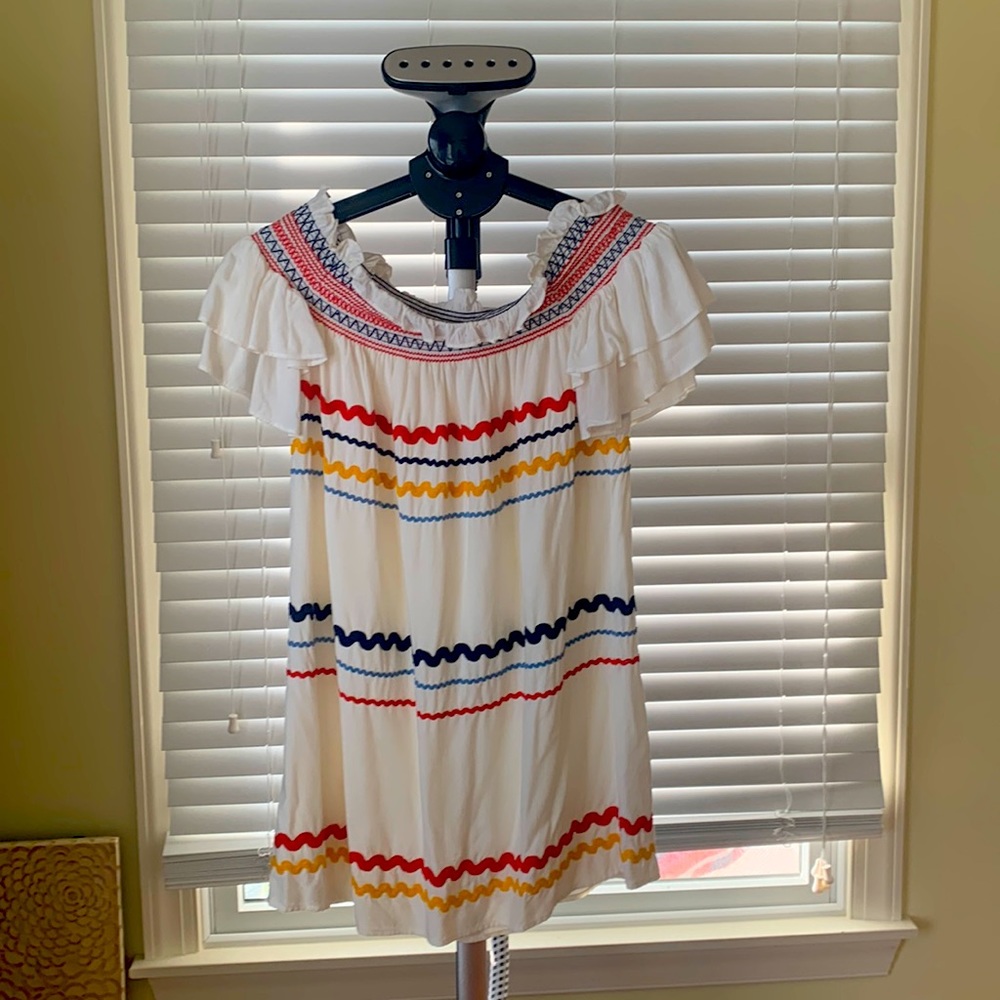 This is a red carter off the shoulder mini sun dress
